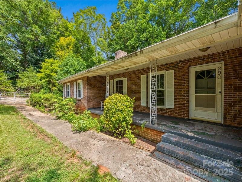 290 South Grandview Road Clover, SC 29710 - Photo 2 of 21 a front view of a house with garden