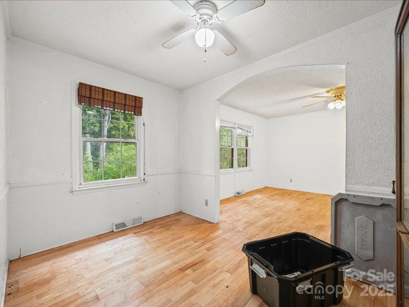 290 South Grandview Road Clover, SC 29710 - Photo 10 of 21 a view of an empty room with wooden floor and a window