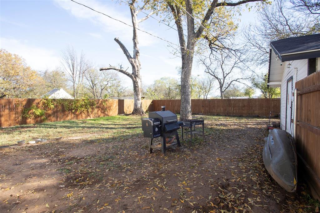 723 Plum Street Graham, TX 76450 - Photo 14 of 20 a view of a yard