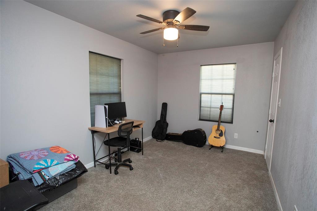 723 Plum Street Graham, TX 76450 - Photo 8 of 20 a workspace with a window