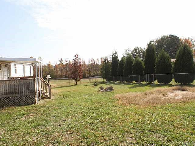 51 Kermit Duncan Road Timberlake, NC 27583 - Photo 2 of 6 a view of a backyard