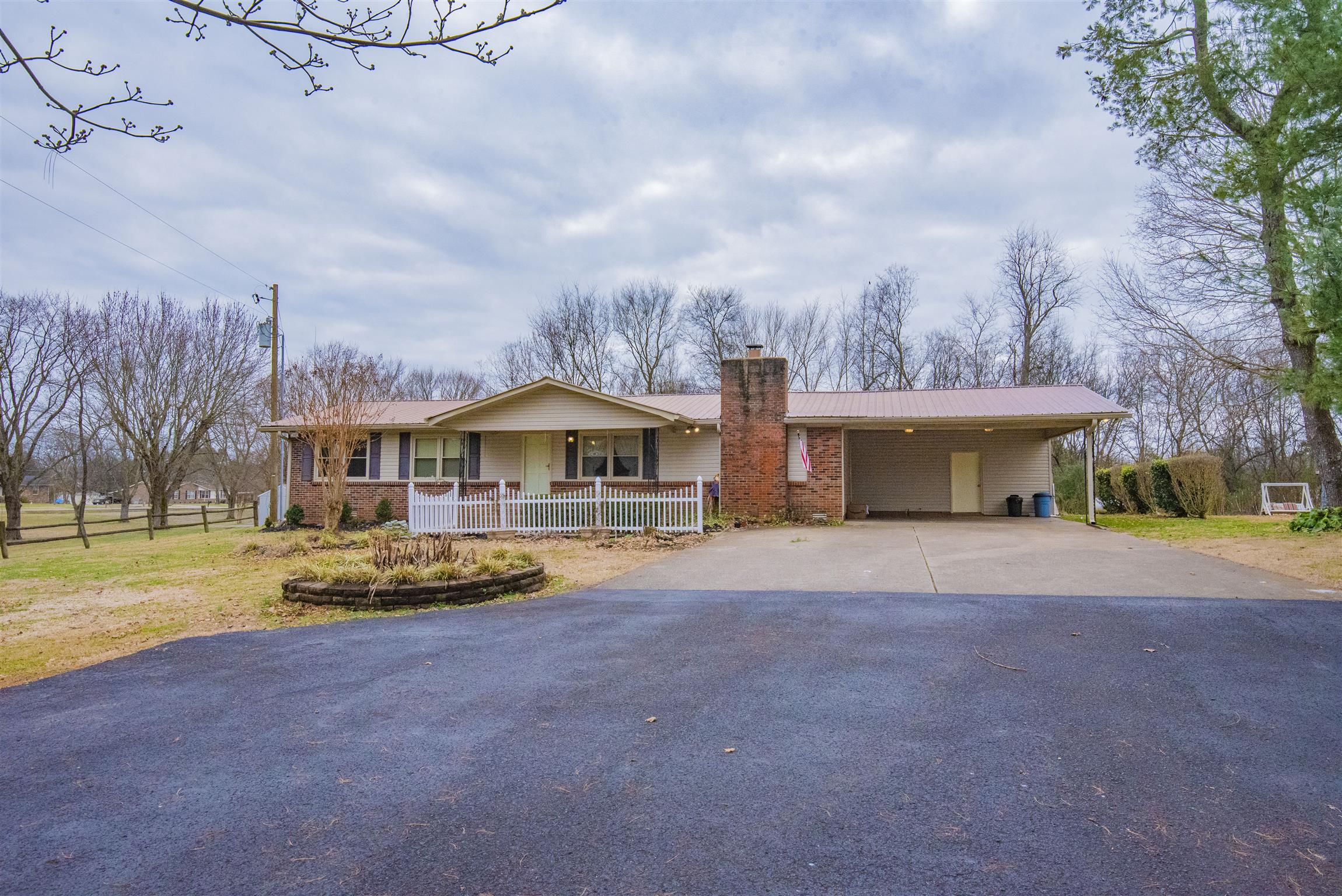 925 Alford Road Murfreesboro, TN 37129 - Photo 1 of 30 a view of a house with a yard and sitting area