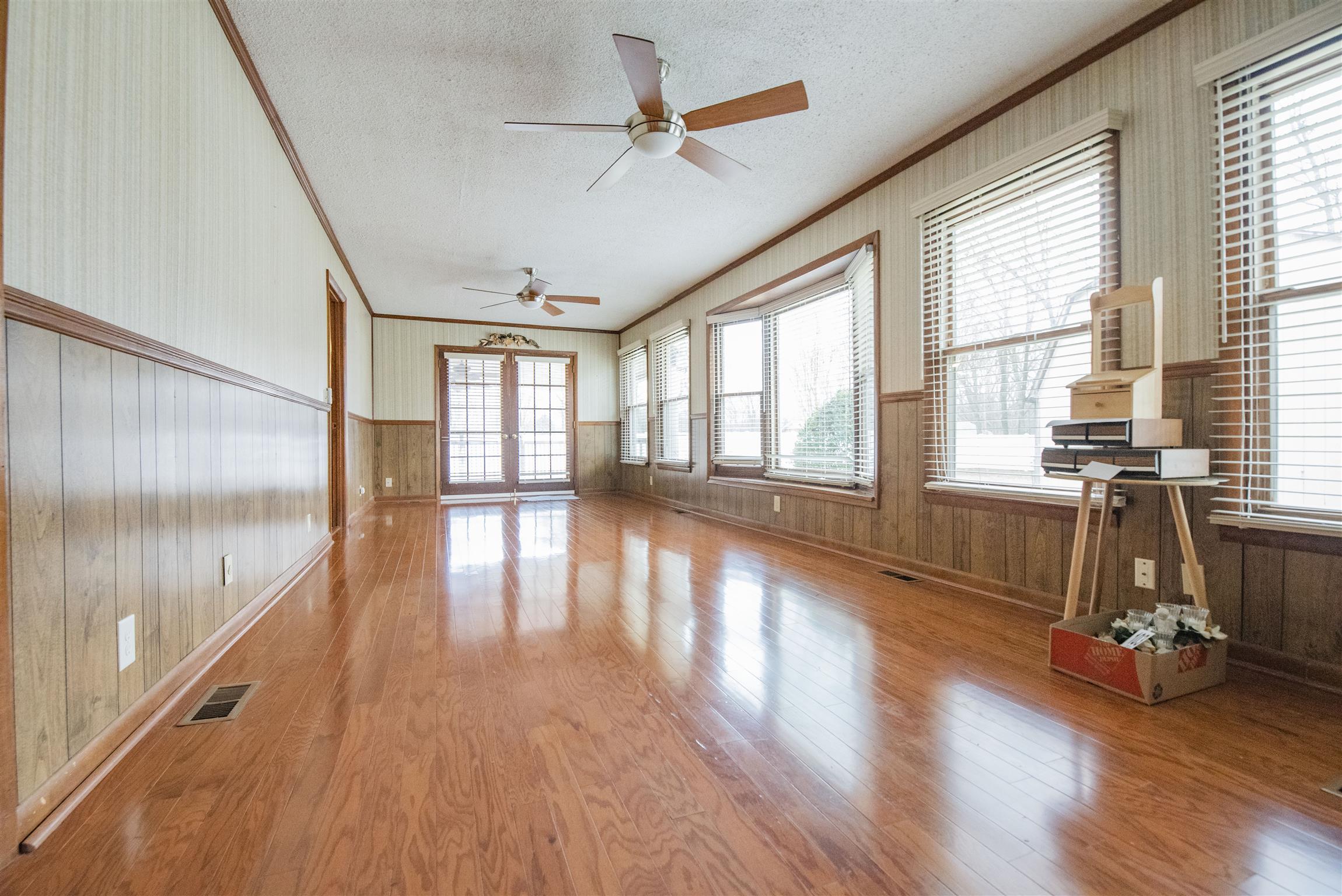 925 Alford Road Murfreesboro, TN 37129 - Photo 15 of 30 a view of an empty room with wooden floor and a window