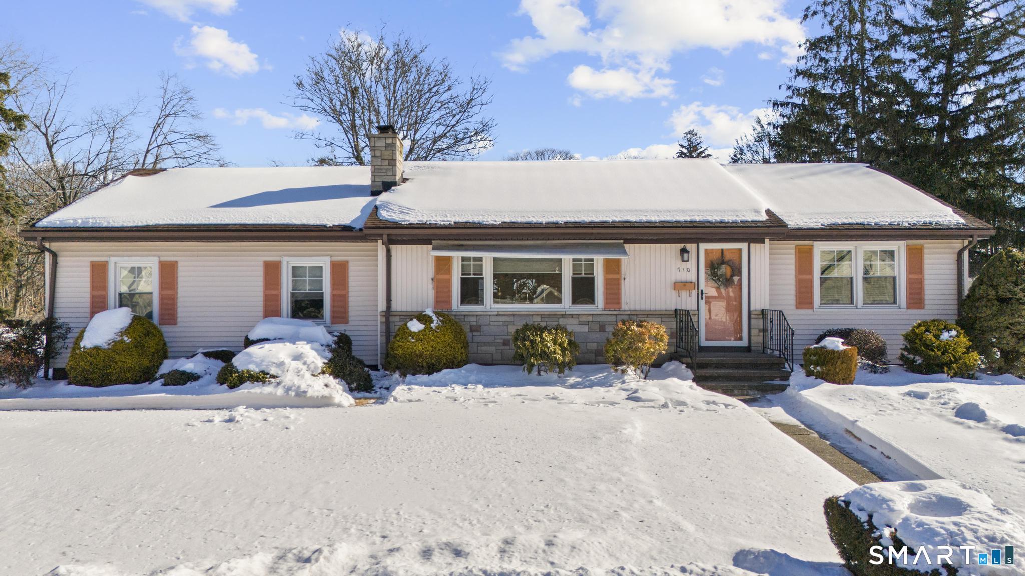 710 East Main Street Stratford, CT 06614 - Photo 1 of 34 a front view of a house with a outdoor seating