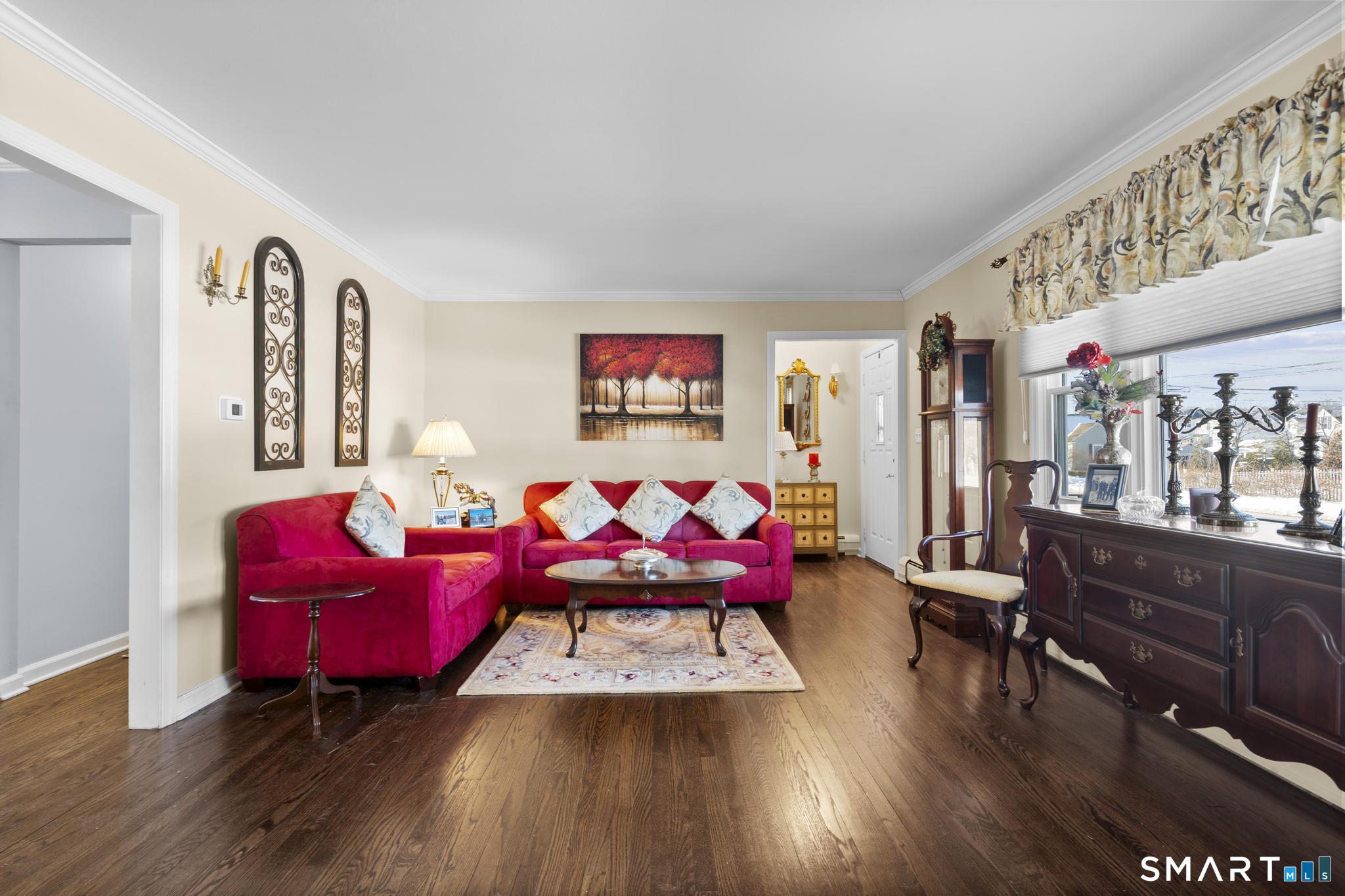 710 East Main Street Stratford, CT 06614 - Photo 12 of 34 a living room with furniture and wooden floor