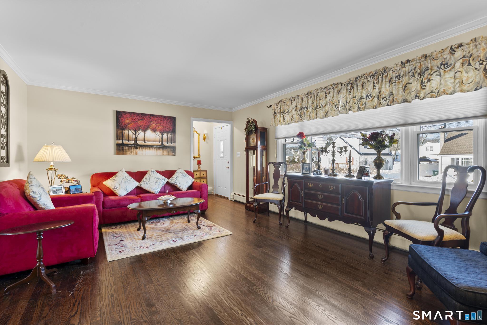 710 East Main Street Stratford, CT 06614 - Photo 13 of 34 a living room with furniture and wooden floor