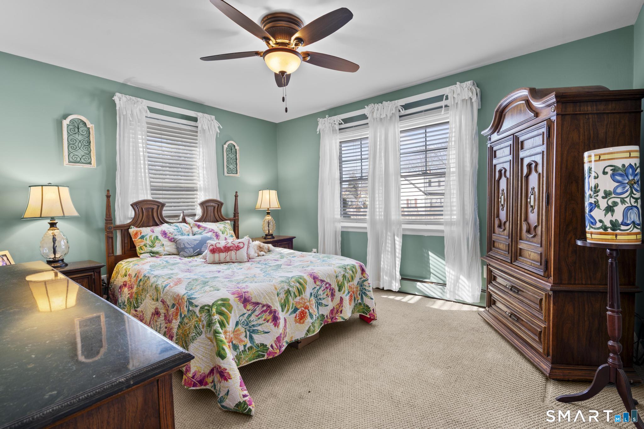 710 East Main Street Stratford, CT 06614 - Photo 16 of 34 a bedroom with bed and window