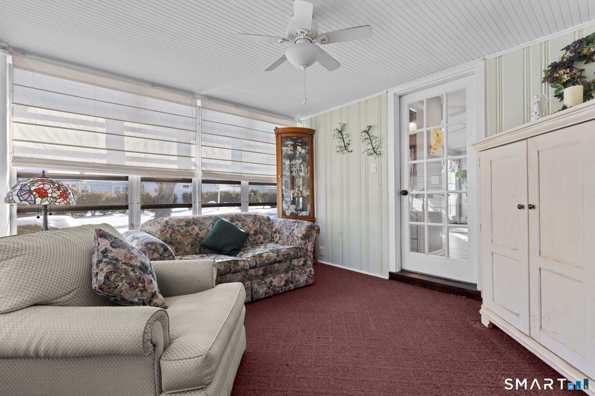 710 East Main Street Stratford, CT 06614 - Photo 2 of 34 a living room with furniture and a window