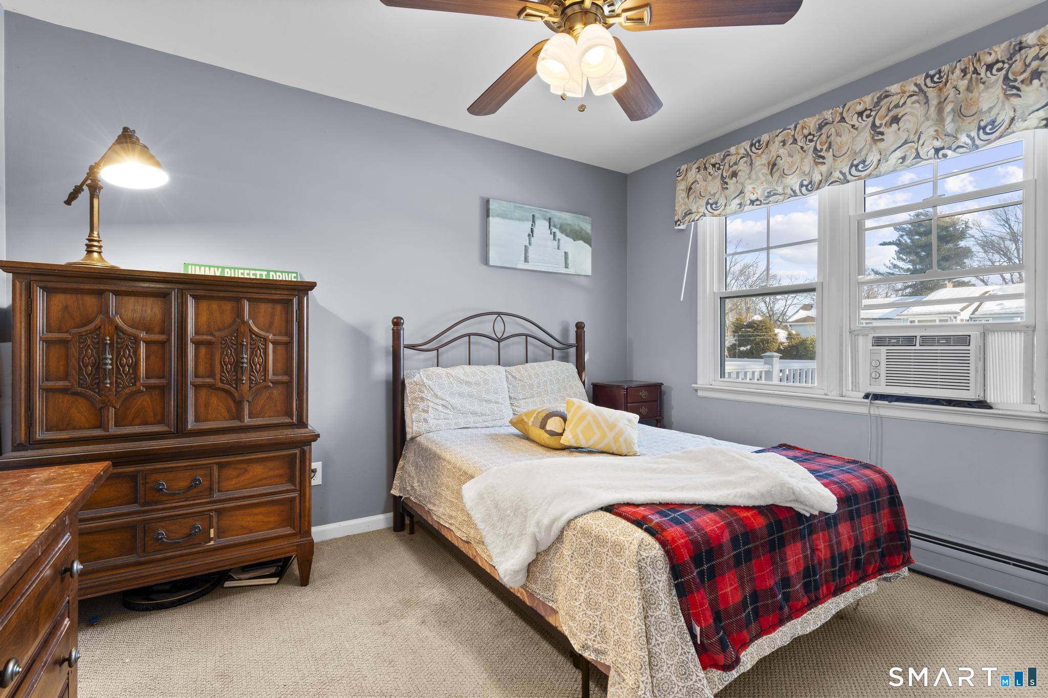 710 East Main Street Stratford, CT 06614 - Photo 22 of 34 a bedroom with a bed and window