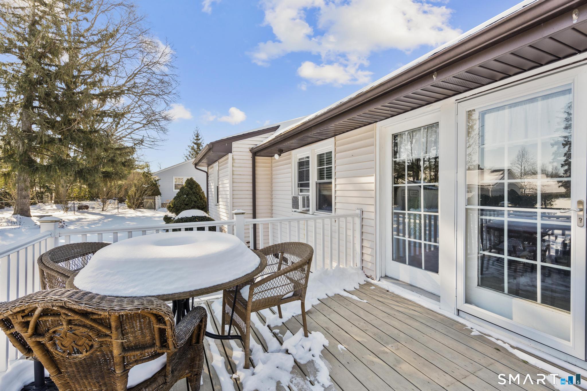 710 East Main Street Stratford, CT 06614 - Photo 25 of 34 a backyard of a house with table and chairs