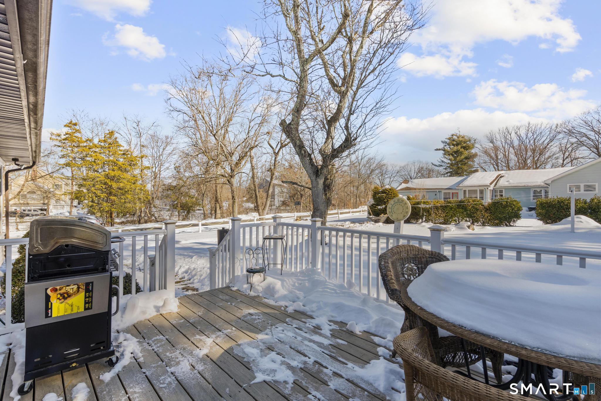 710 East Main Street Stratford, CT 06614 - Photo 26 of 34 a view of a house with backyard and sitting area