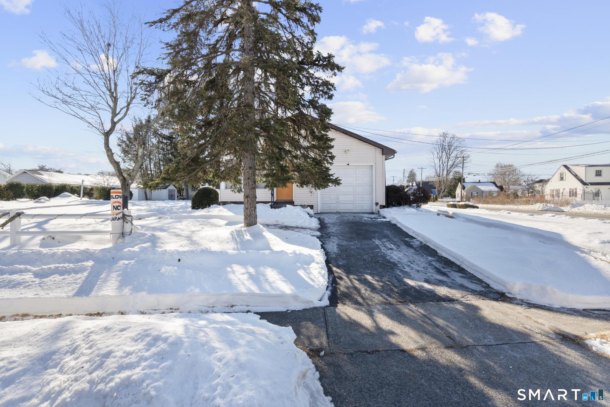 710 East Main Street Stratford, CT 06614 - Photo 31 of 34 a street view with residential house