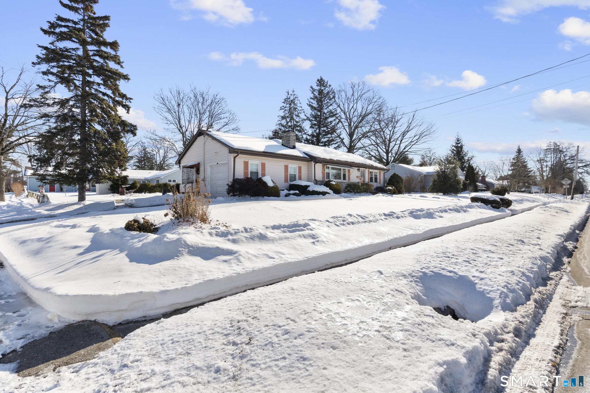 710 East Main Street Stratford, CT 06614 - Photo 32 of 34 a view of a house with snow on the ground