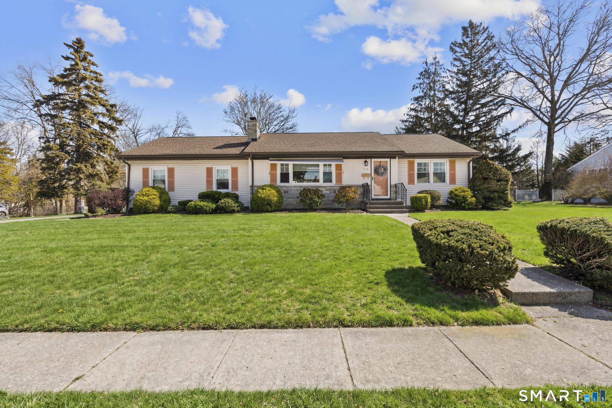710 East Main Street Stratford, CT 06614 - Photo 34 of 34 a front view of a house with garden