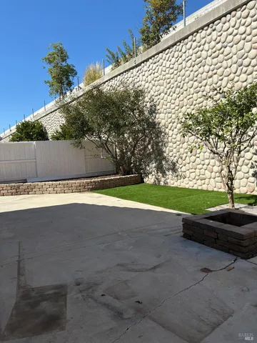 a house view with a outdoor space