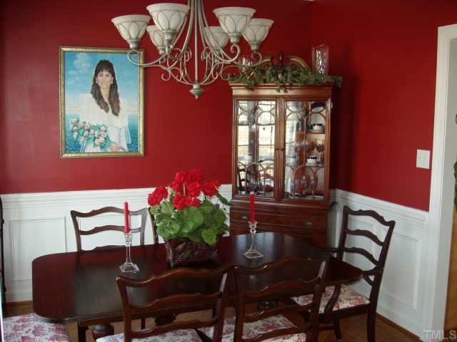 1613 Kendall Hill Road Willow Spring, NC 27592 - Photo 3 of 10 a view of a dining room with furniture and window