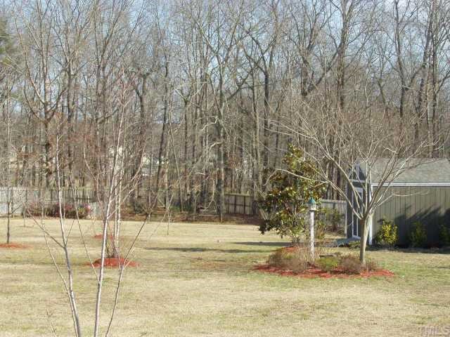 1613 Kendall Hill Road Willow Spring, NC 27592 - Photo 8 of 10 a view of yard with tree