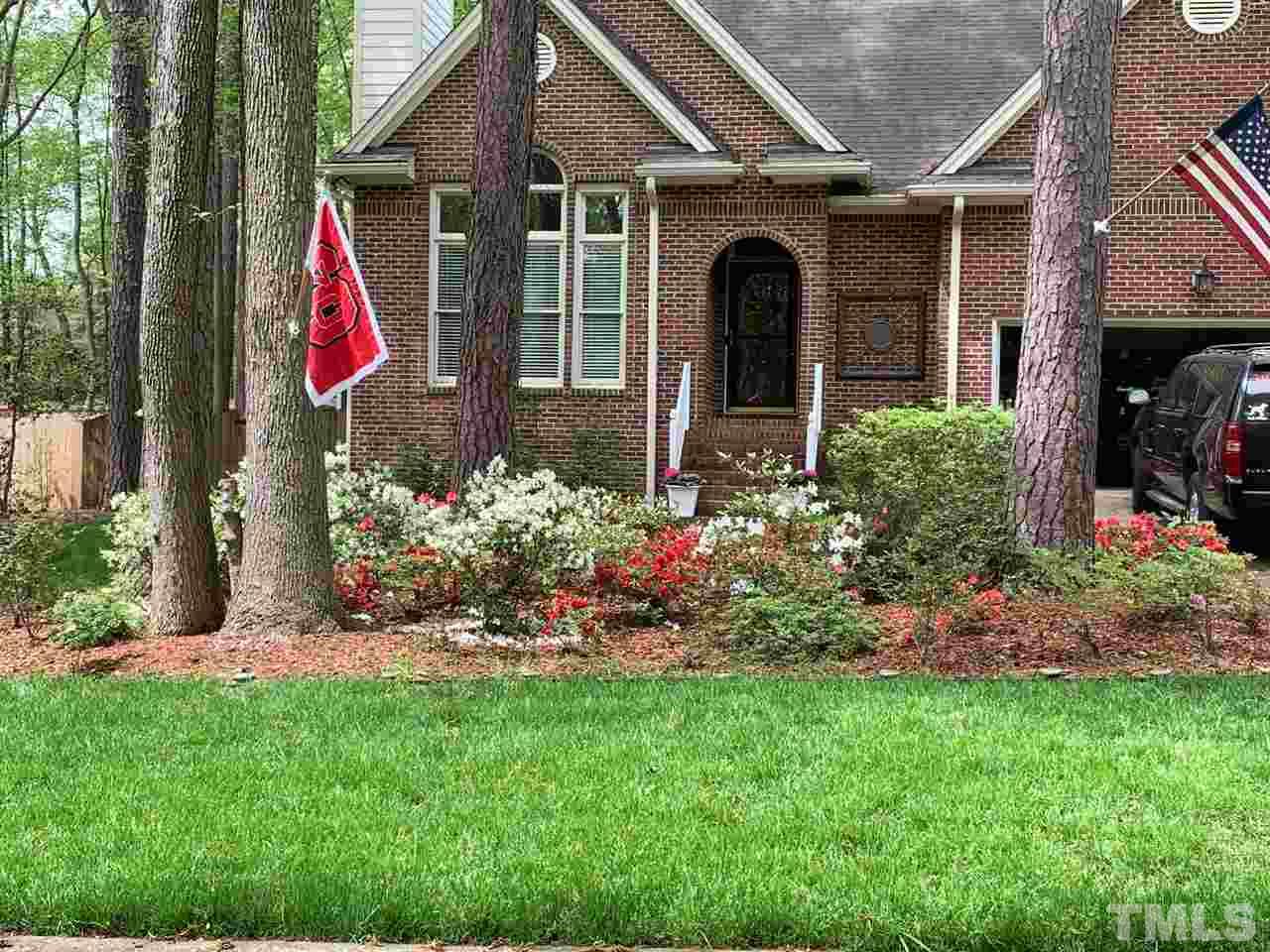 2017 Treverton Place Raleigh, NC 27609 - Photo 1 of 6 a view of a house with potted and front door