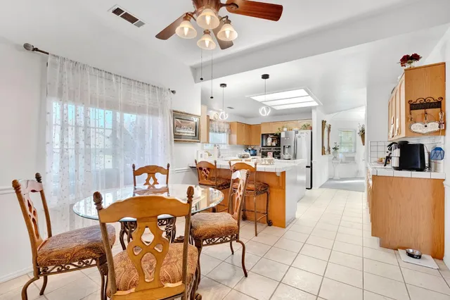 a view of a dining room with furniture
