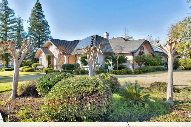 a house view with a garden space