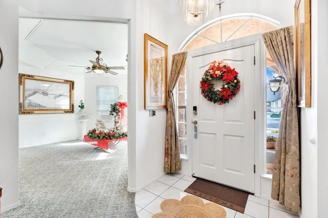 an entryway with wooden floor