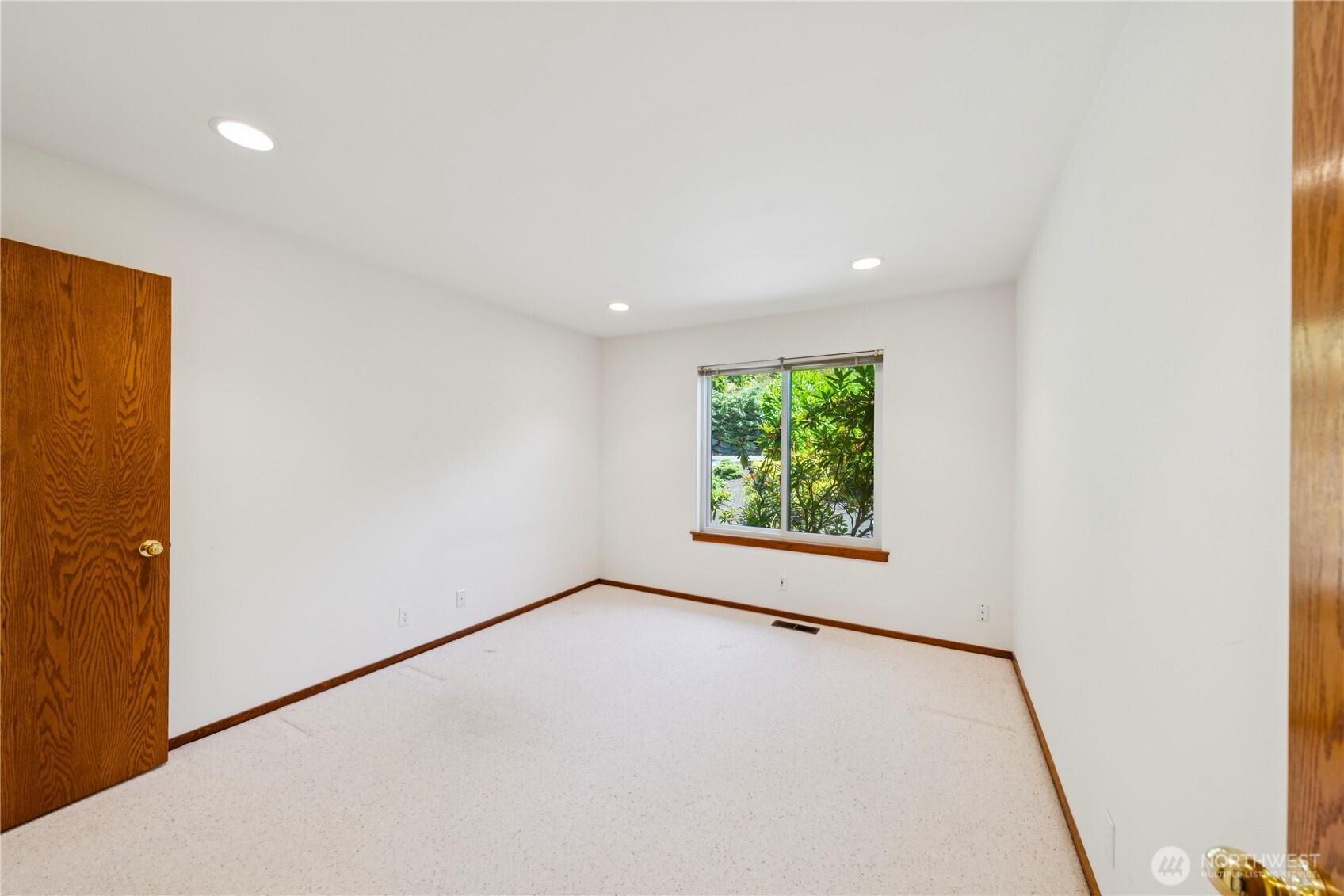4158 Islander Way Anacortes, WA 98221 - Photo 22 of 40 a view of an empty room with a window