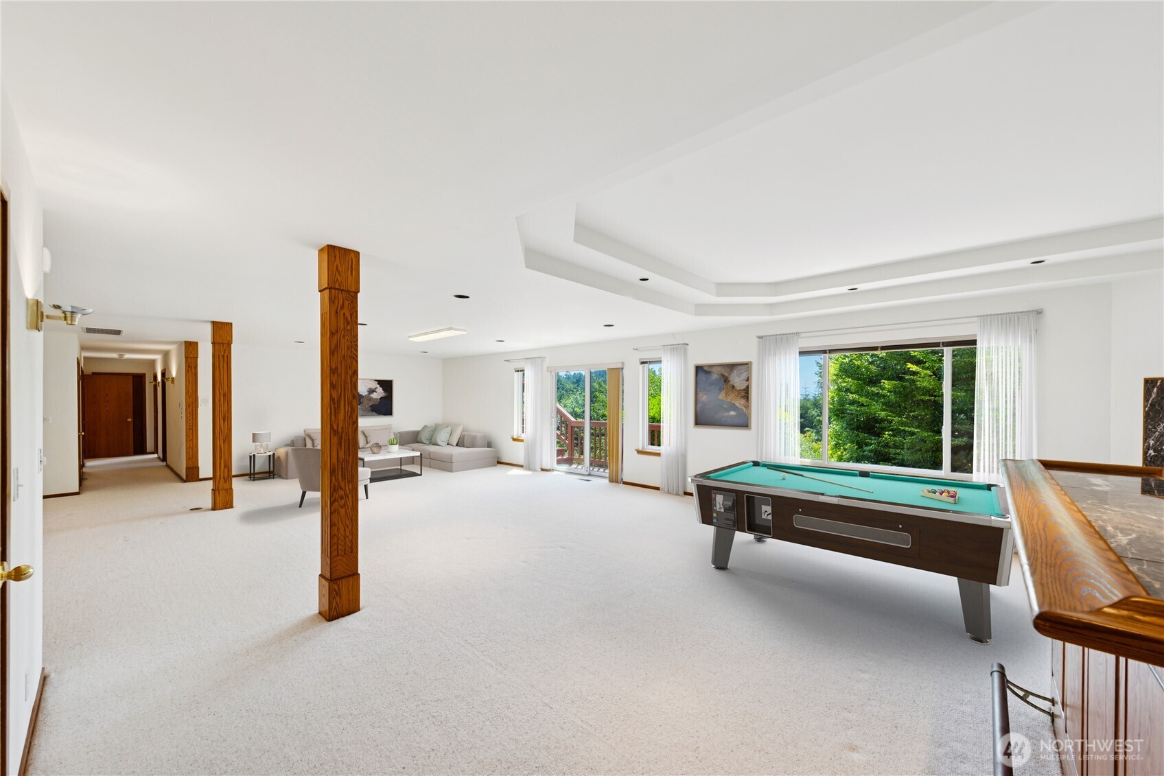 4158 Islander Way Anacortes, WA 98221 - Photo 28 of 40 a living room with furniture fireplace and a large window