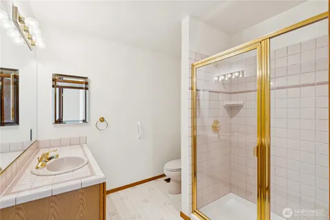 a view of a hallway with a white walls