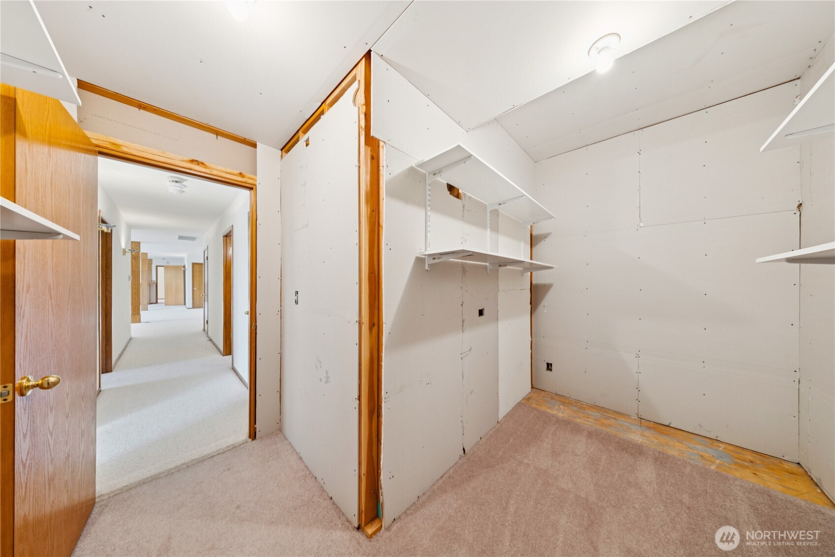 4158 Islander Way Anacortes, WA 98221 - Photo 35 of 40 a view of a hallway with a white walls