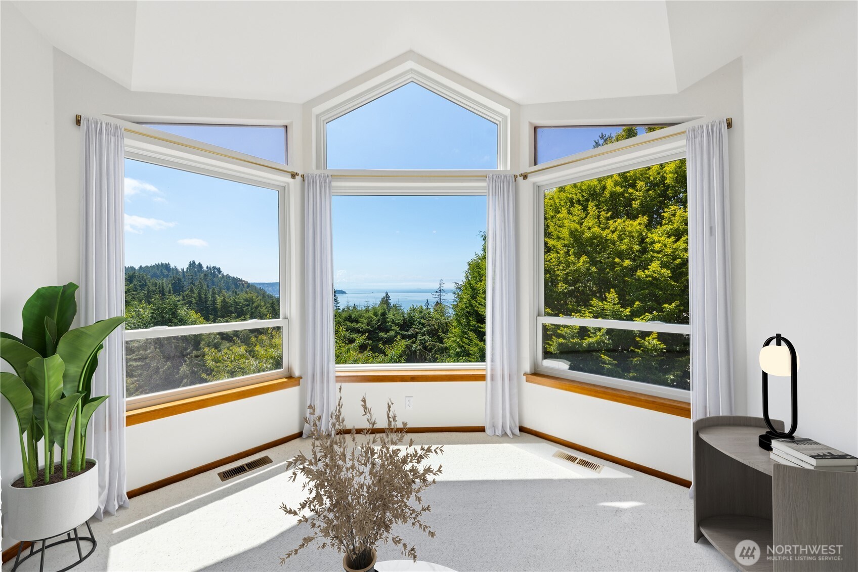 4158 Islander Way Anacortes, WA 98221 - Photo 5 of 40 a view of a living room and a floor to ceiling window