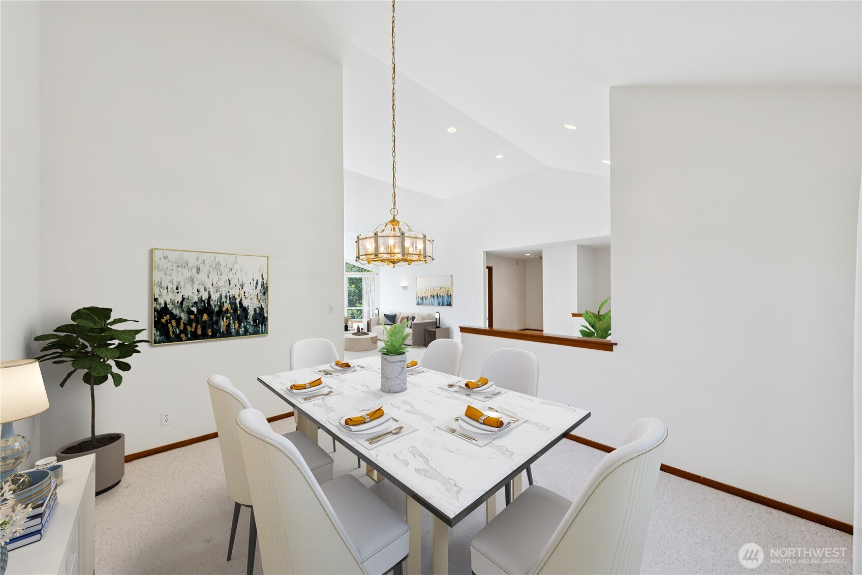 4158 Islander Way Anacortes, WA 98221 - Photo 8 of 40 a view of a dining table and chairs in the room