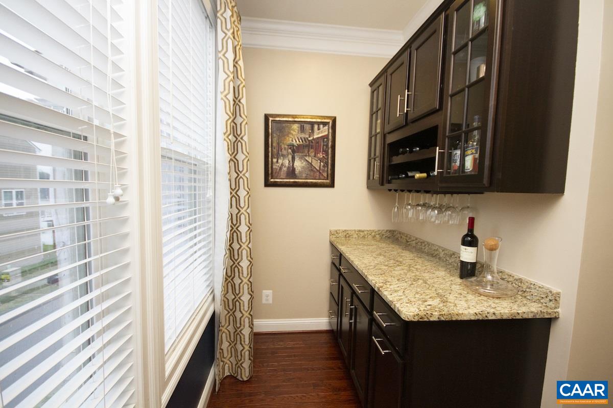 2122 Avinity Loop Charlottesville, VA 22902 - Photo 15 of 27 a kitchen with a sink a microwave a stove and refrigerator