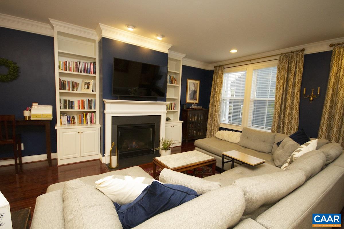 2122 Avinity Loop Charlottesville, VA 22902 - Photo 7 of 27 a living room with furniture fireplace and flat screen tv