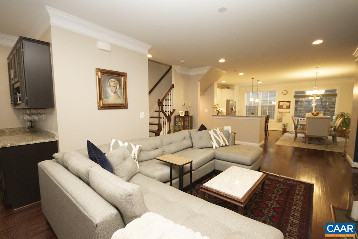2122 Avinity Loop Charlottesville, VA 22902 - Photo 8 of 27 a living room with furniture and a flat screen tv