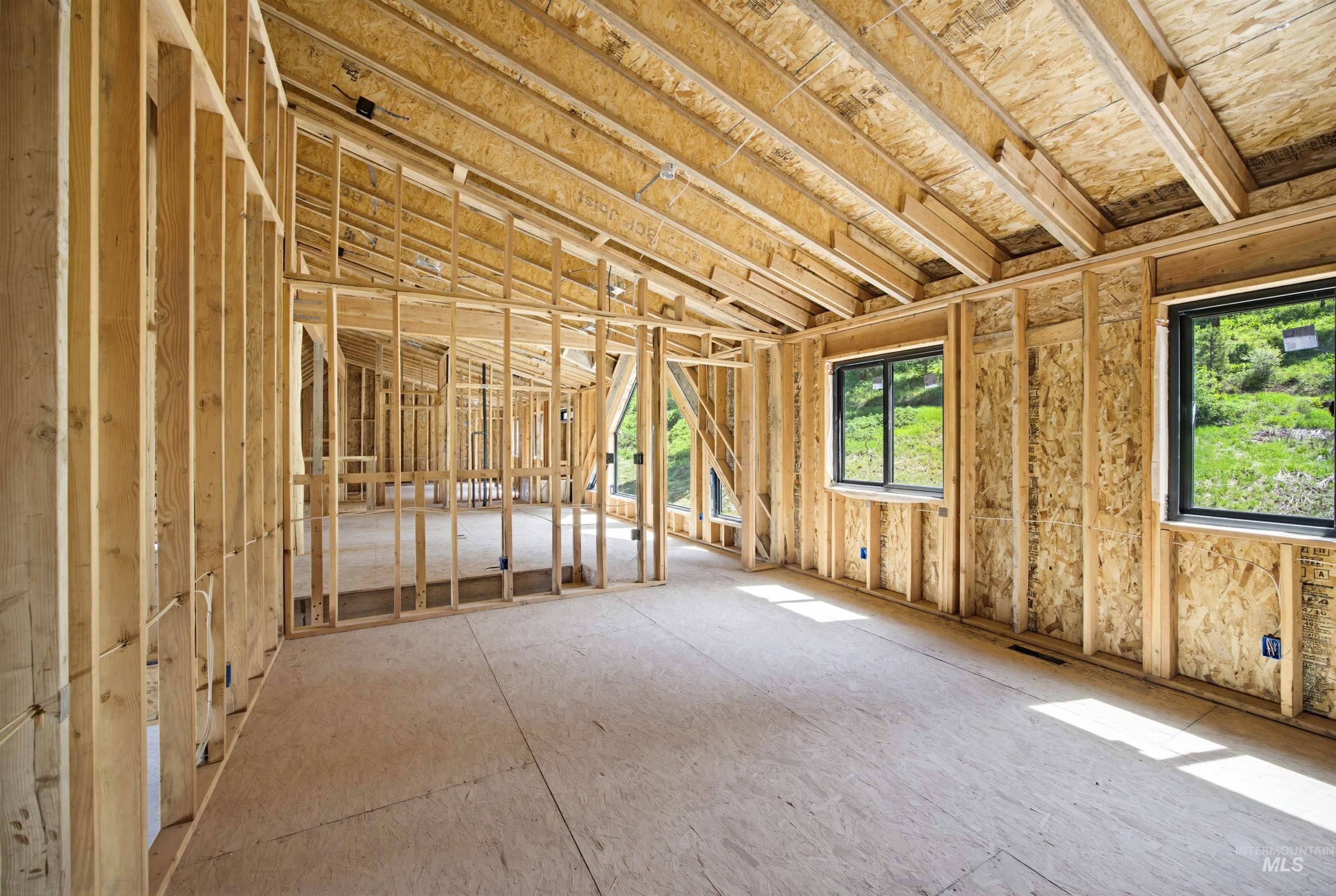 3322 Big Creek Road New Meadows, ID 83654 - Photo 35 of 50 New construction interior framing featuring unfinished wood walls and ceilings