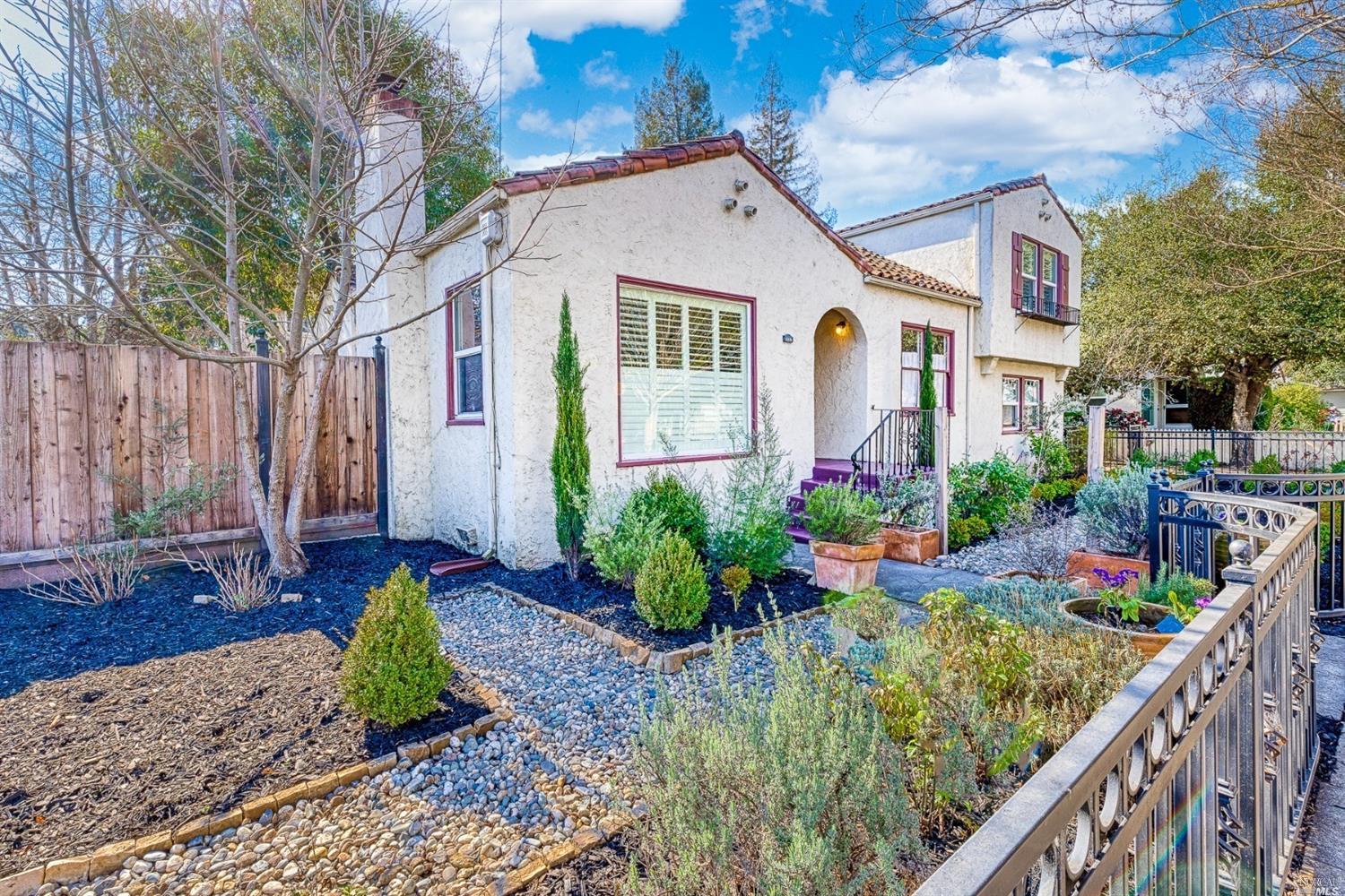 330 Lincoln Street Santa Rosa, CA 95401 - Photo 1 of 1 Rare Spanish Mediterranean beauty built in 1938! This home has 4 bedrooms, 2 and 1/2 bathrooms, updated kitchen, dining room, informal dining room with classic built-in cupboard, mud room, utility room with laundry and a detached garage. The property has a stunning wrought iron fence and is gated. The backyard is spacious and great for entertainment. There is a bedroom on the main floor, a master suite downstairs and 2 bedrooms upstairs. If you love vintage homes, you will love the details, updates, quirks and charm!