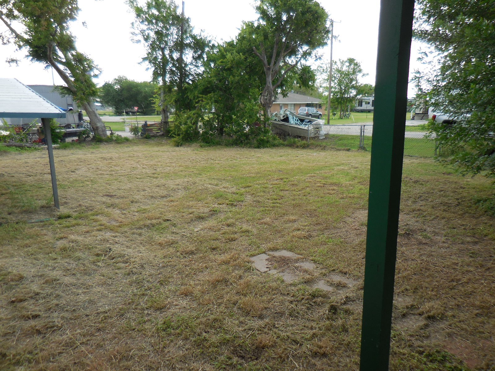 628 Austin Street West Matagorda, TX 77457 - Photo 11 of 19 a view of a outdoor space and a yard