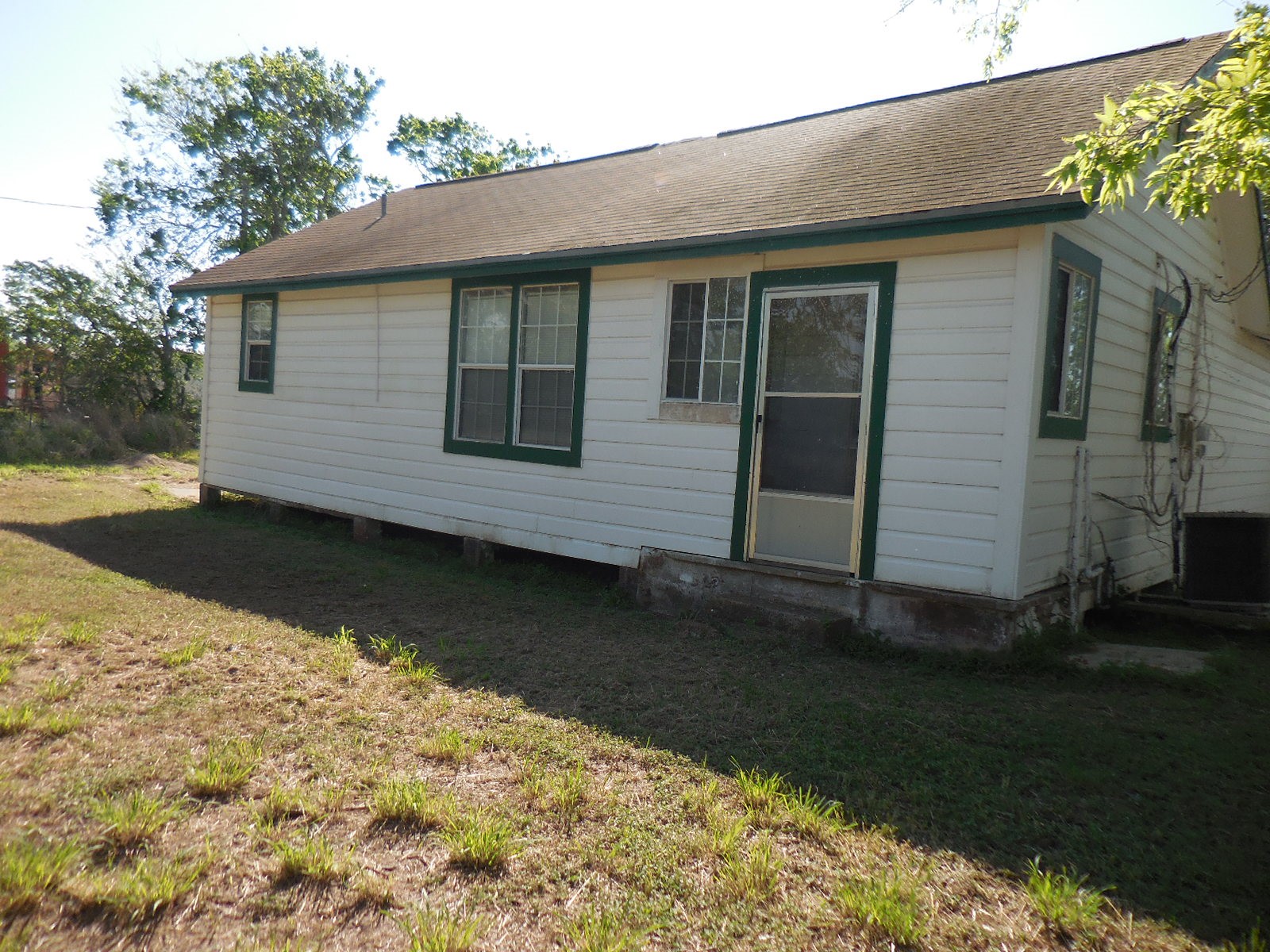628 Austin Street West Matagorda, TX 77457 - Photo 5 of 19 a view of a house with a yard