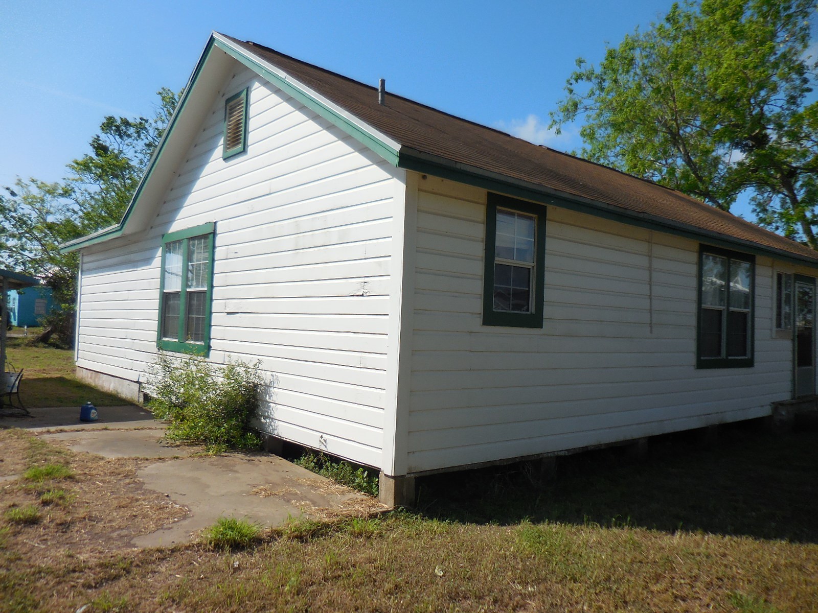 628 Austin Street West Matagorda, TX 77457 - Photo 6 of 19 a view of a house with a yard