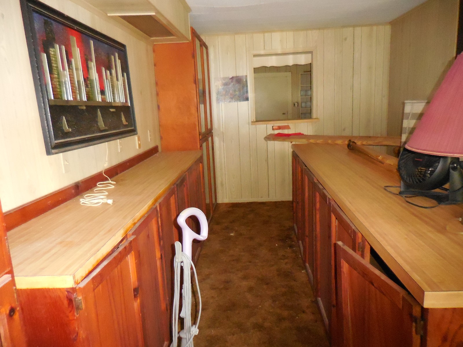 628 Austin Street West Matagorda, TX 77457 - Photo 9 of 19 a bathroom with a sink a mirror and a toilet