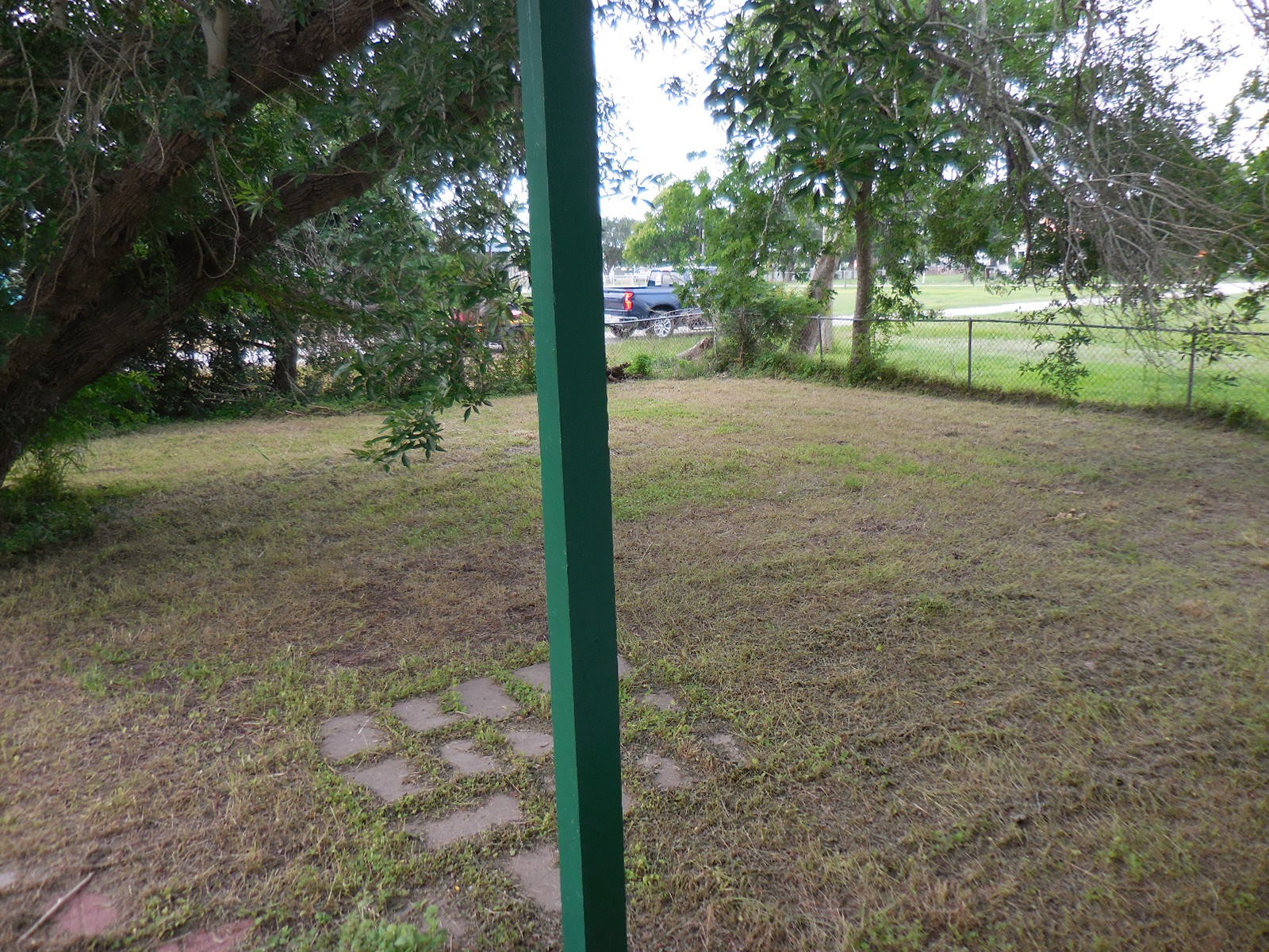 628 Austin Street West Matagorda, TX 77457 - Photo 10 of 19 a view of a yard with plants and trees