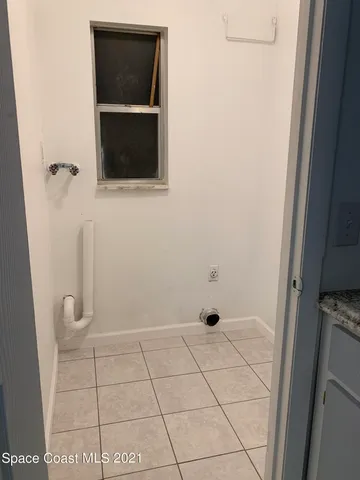 a bathroom with a shower and a toilet