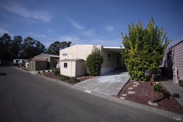 a view of a house with a street