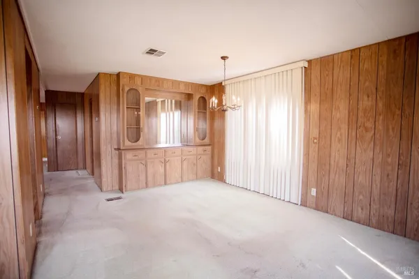 a view of a bathroom with a glass door