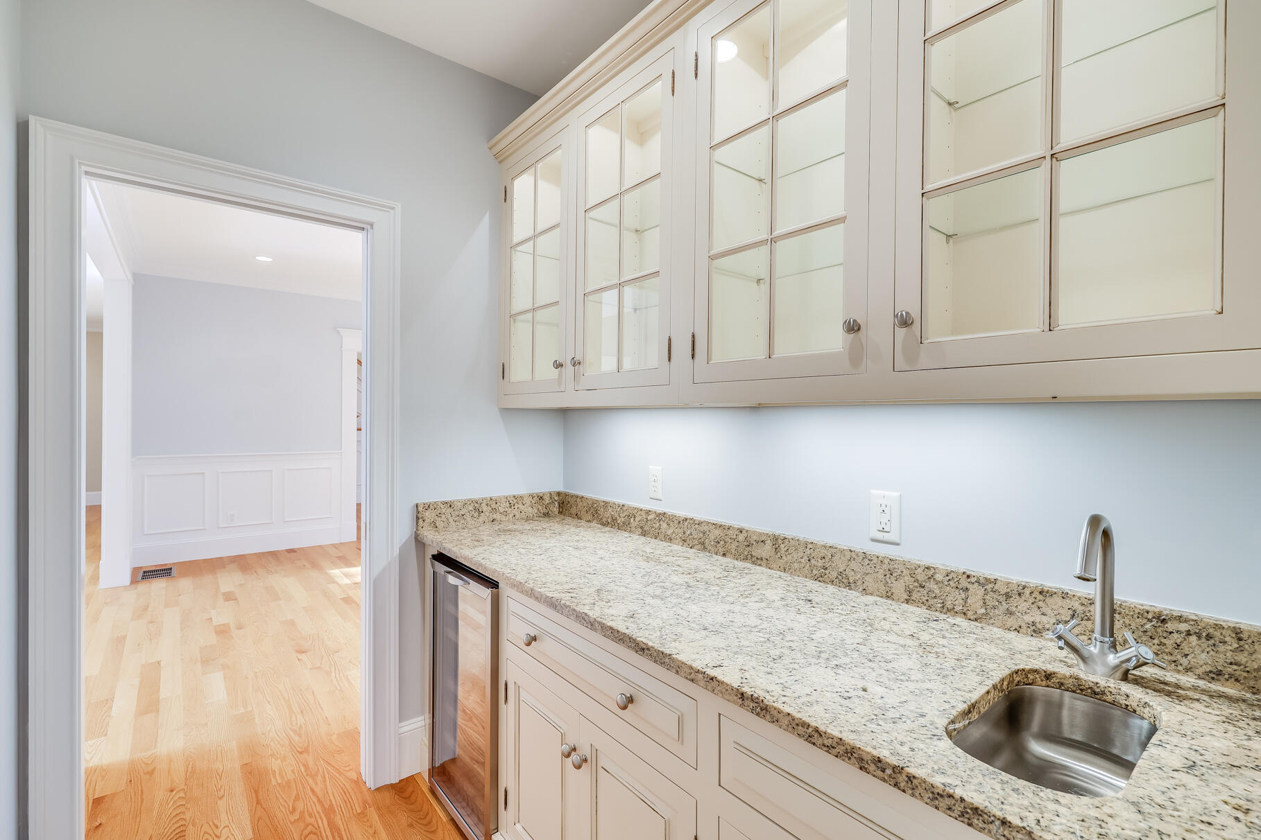 29 Reflection Drive Sandwich, MA 02563 - Photo 15 of 51 a kitchen with granite countertop white cabinets and a sink
