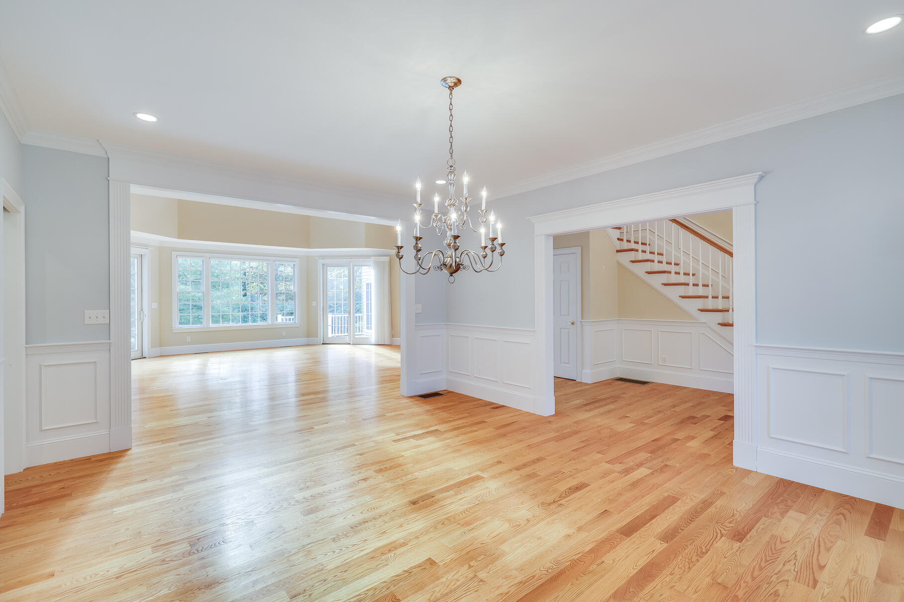 29 Reflection Drive Sandwich, MA 02563 - Photo 17 of 51 a view of an empty room with window and wooden floor