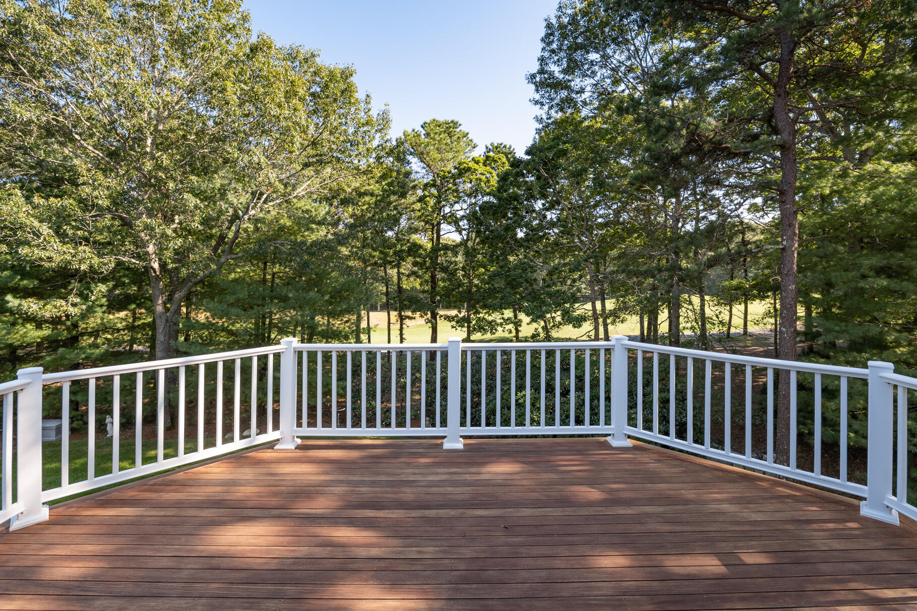 29 Reflection Drive Sandwich, MA 02563 - Photo 30 of 51 a view of a deck with a trees