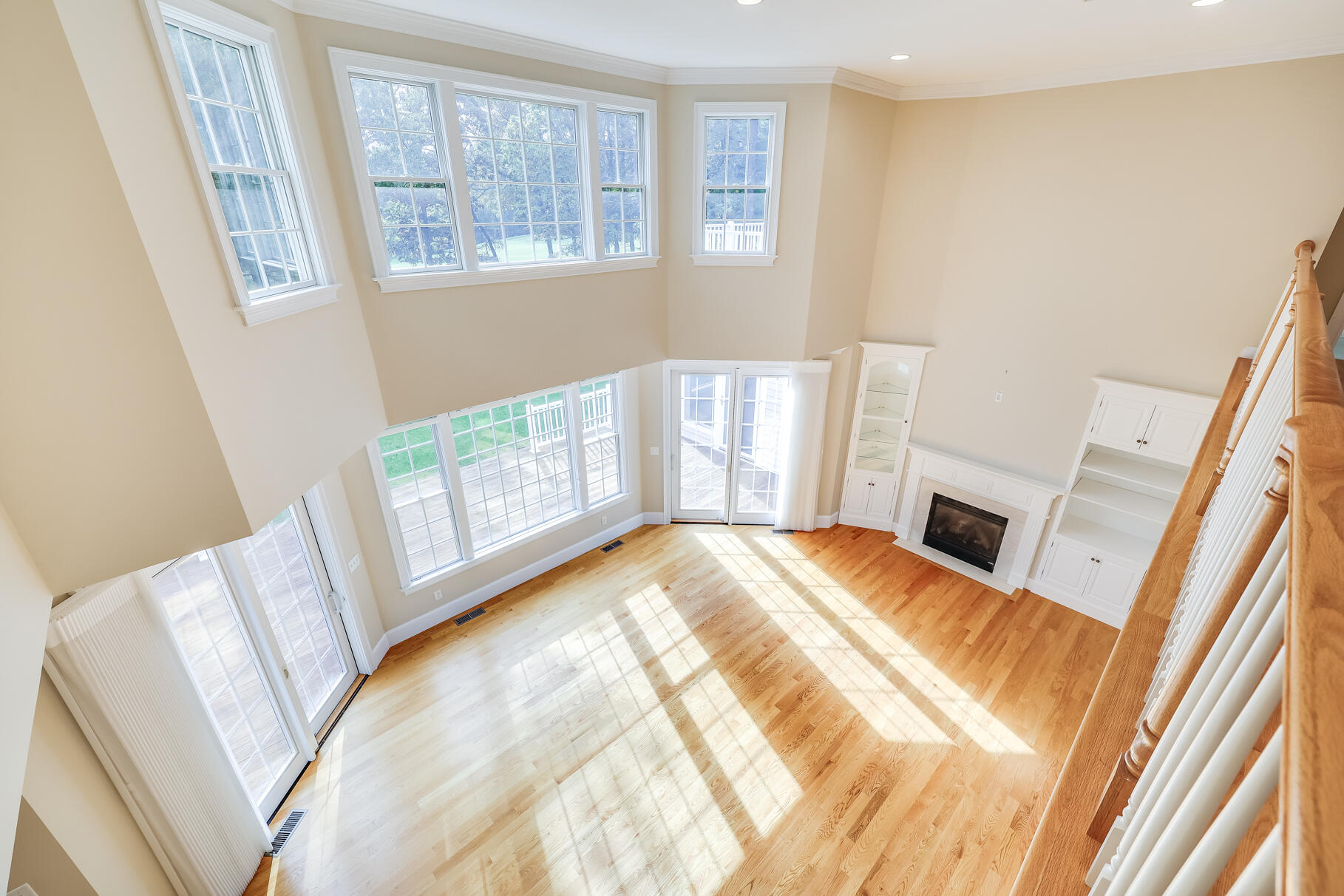29 Reflection Drive Sandwich, MA 02563 - Photo 34 of 51 a view of an empty room with wooden floor and a window