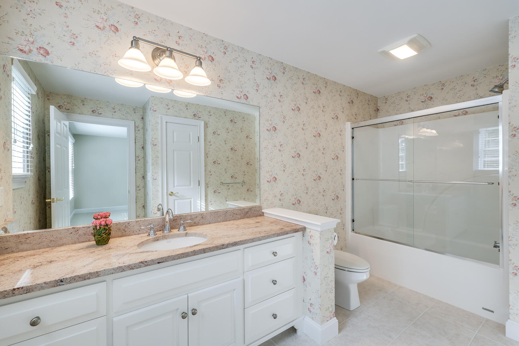 29 Reflection Drive Sandwich, MA 02563 - Photo 37 of 51 a bathroom with a granite countertop sink a toilet and shower