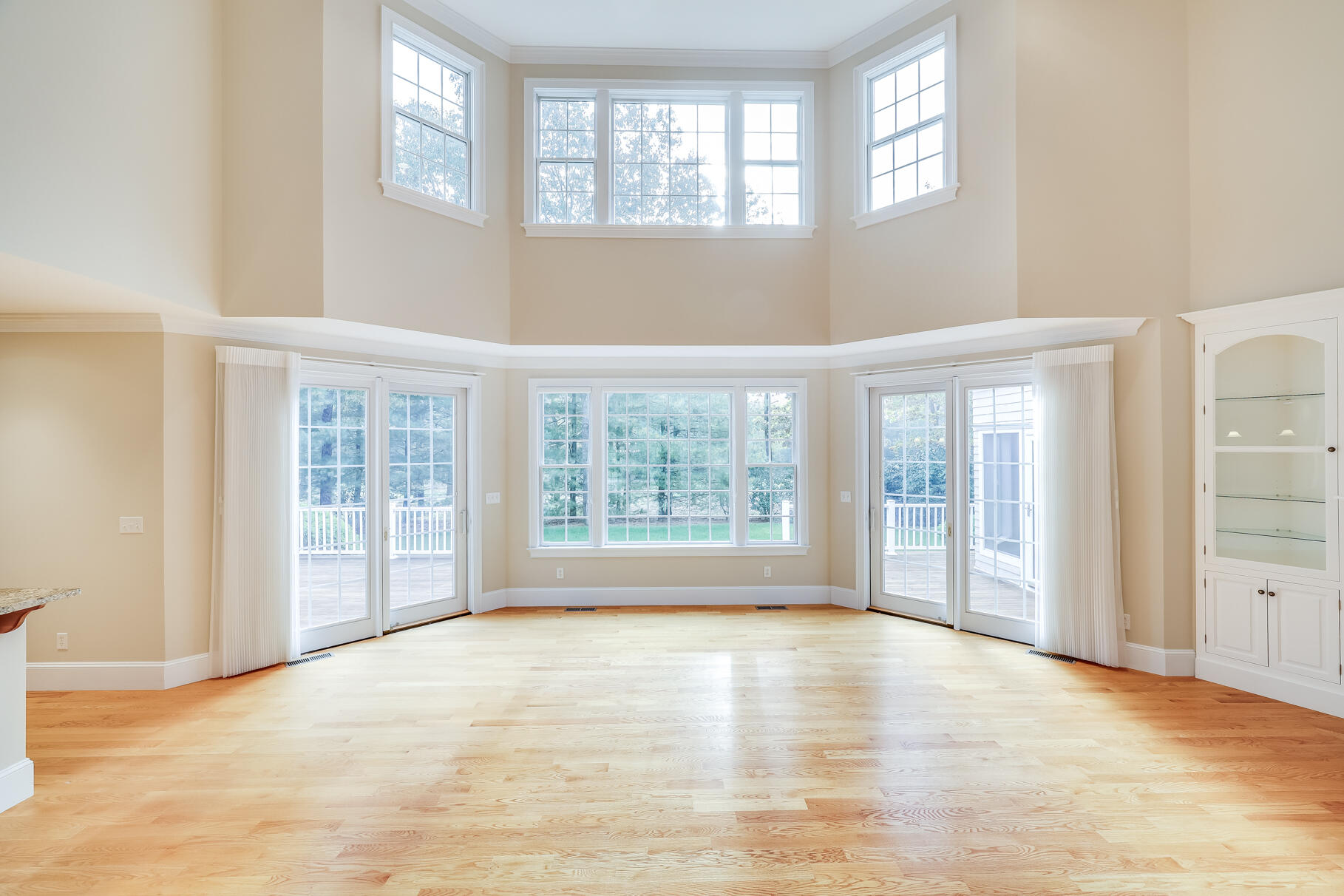 29 Reflection Drive Sandwich, MA 02563 - Photo 4 of 51 a view of an empty room with a window